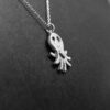 pendentif en argent gravé - Le petit poulpe au grand cœur